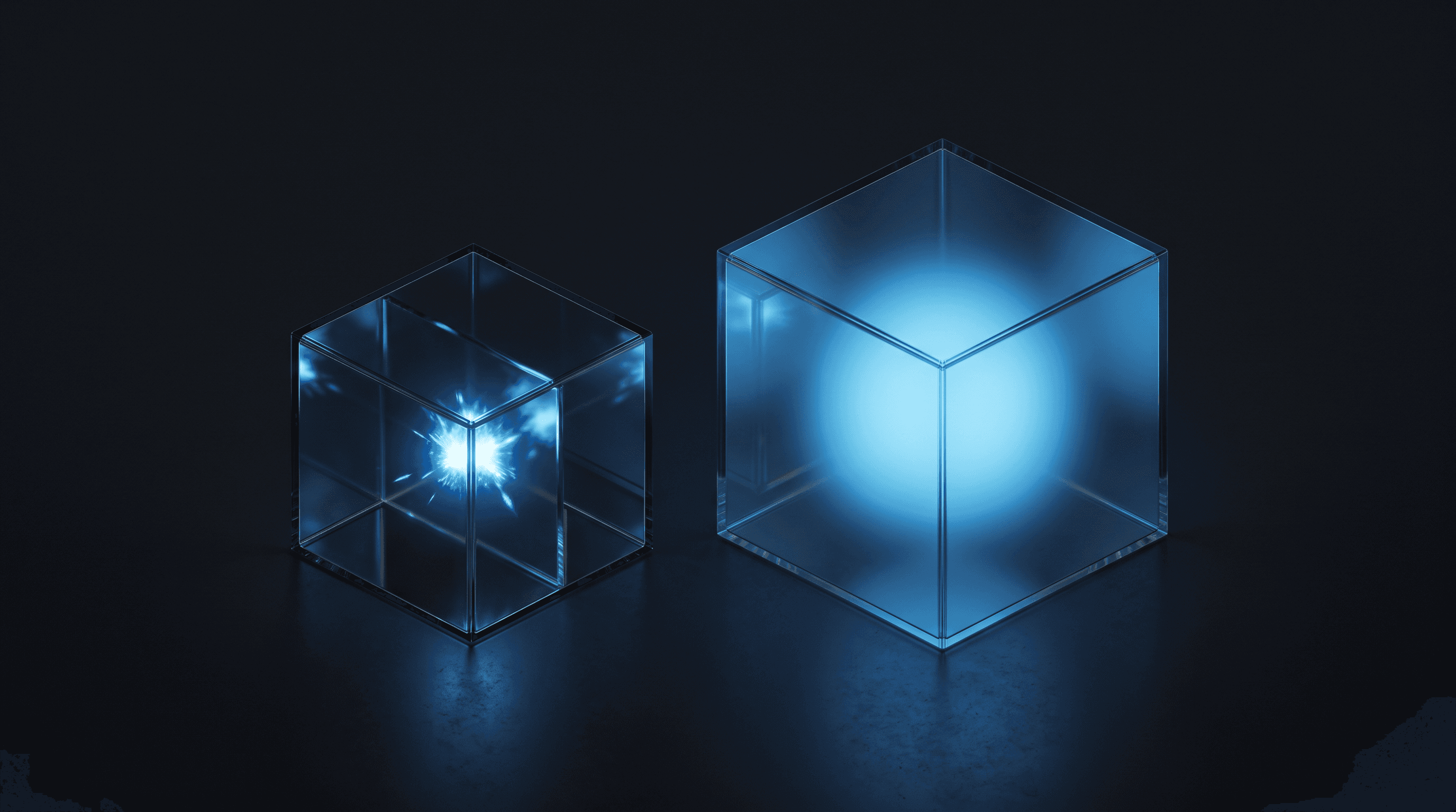 A small sparking glass cell beside a larger steadily glowing one